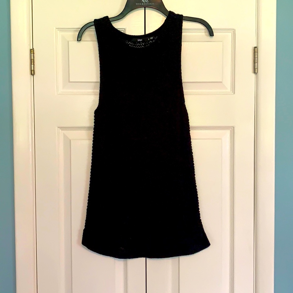 Sports girl black tank top.